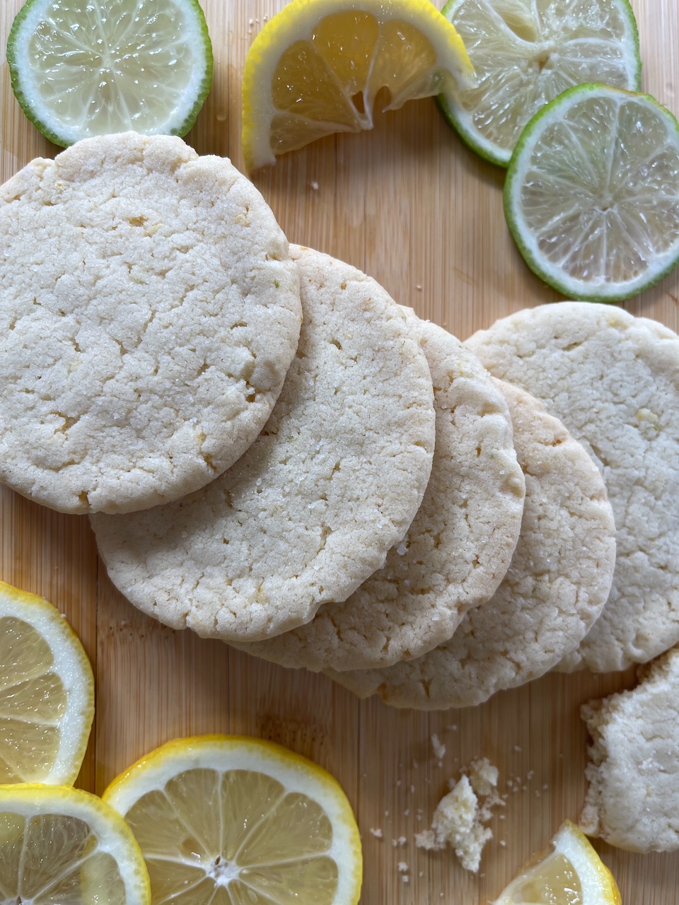 Lemon-lime sugar cookies on a wood board